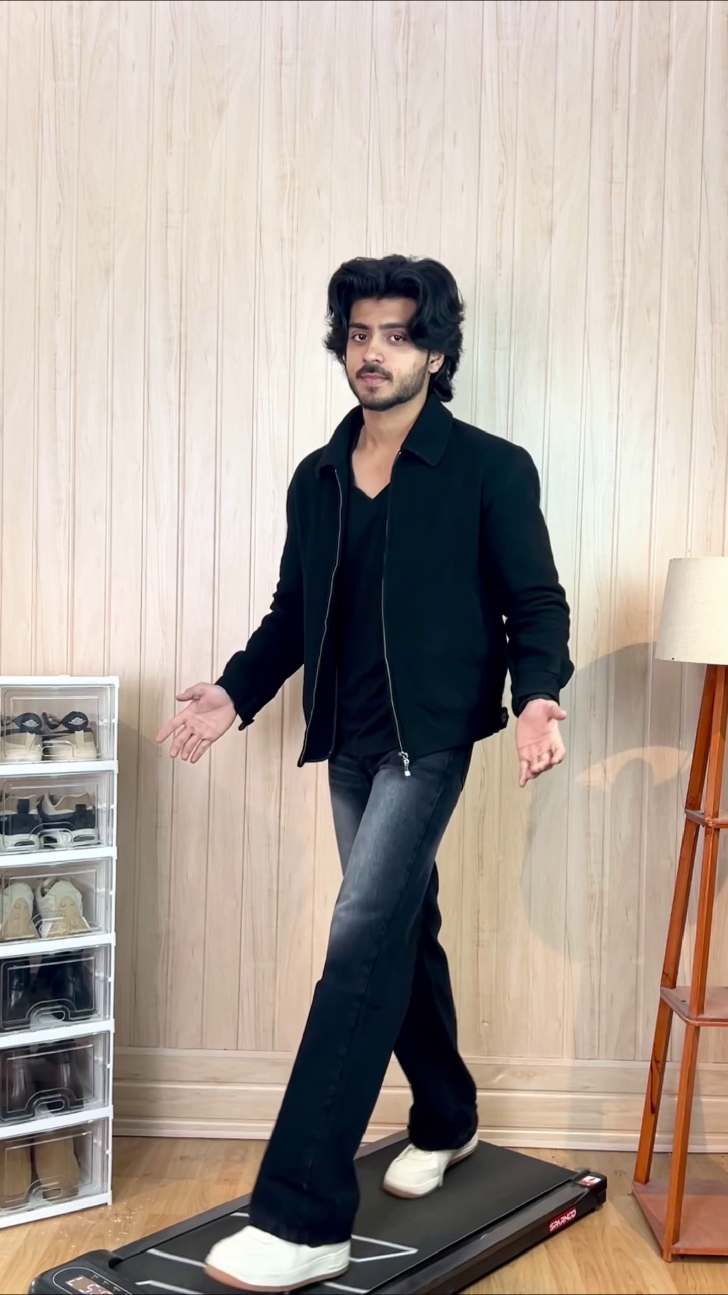 Men’s All-Black Jacket Outfit with Flared Denim`