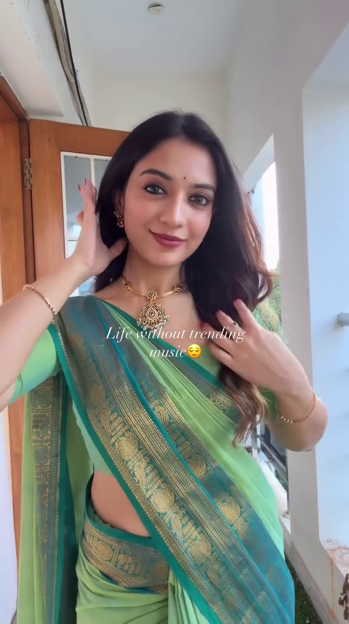 Graceful Green Banarasi Saree Glow