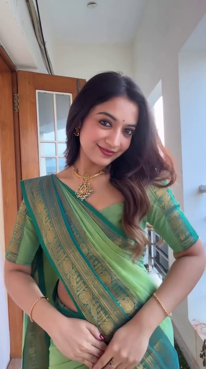 Graceful Green Banarasi Saree Glow