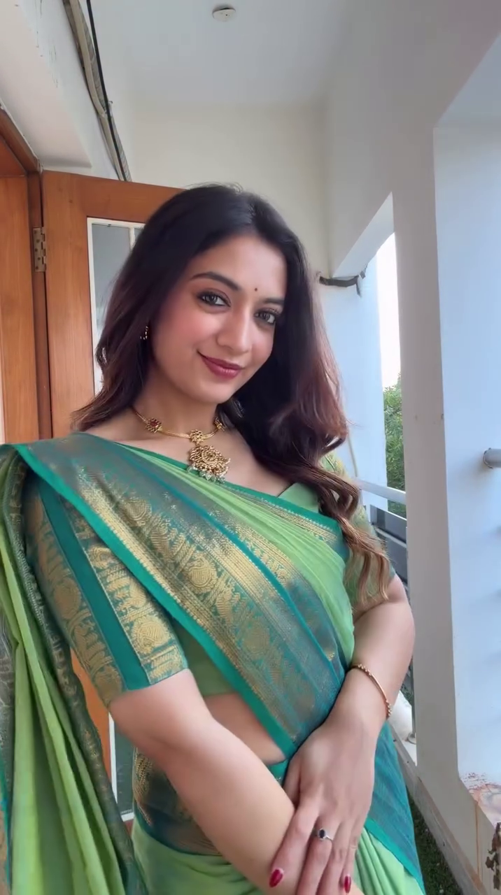 Graceful Green Banarasi Saree Glow